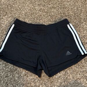 Adidas black Shorts with White Stripes. Size small.